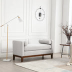 Panca imbottita con gambe in legno