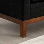 Panca imbottita con gambe in legno