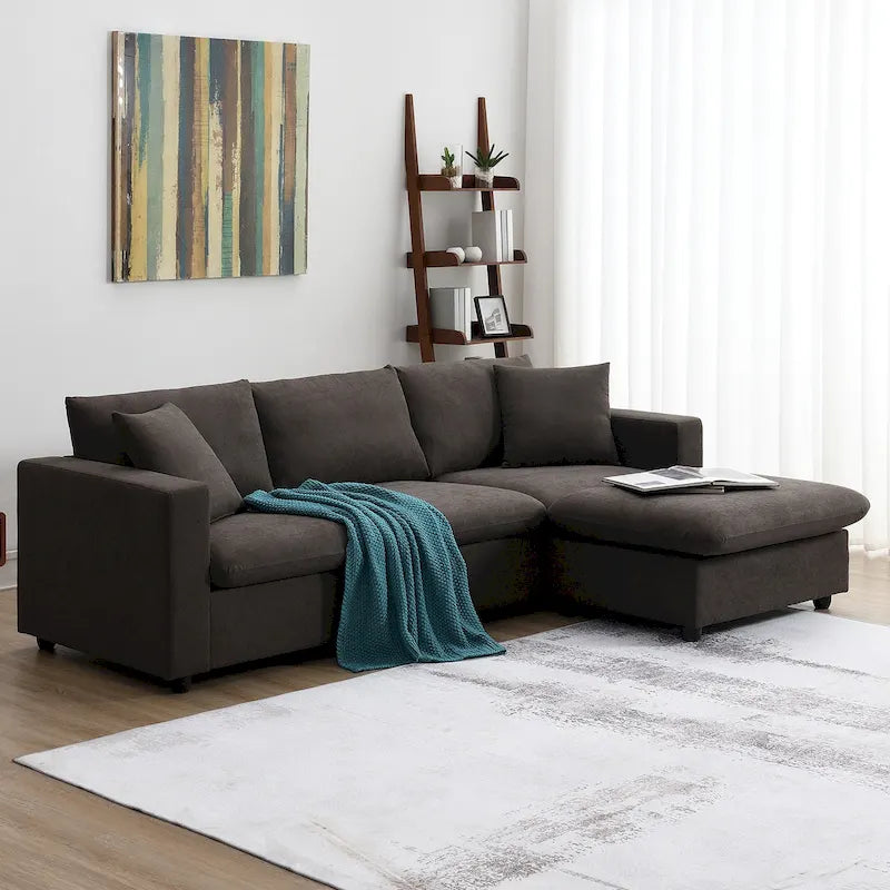 Divano componibile a L moderno a 4 posti, con 2 cuscini omaggio, pouf convertibile
